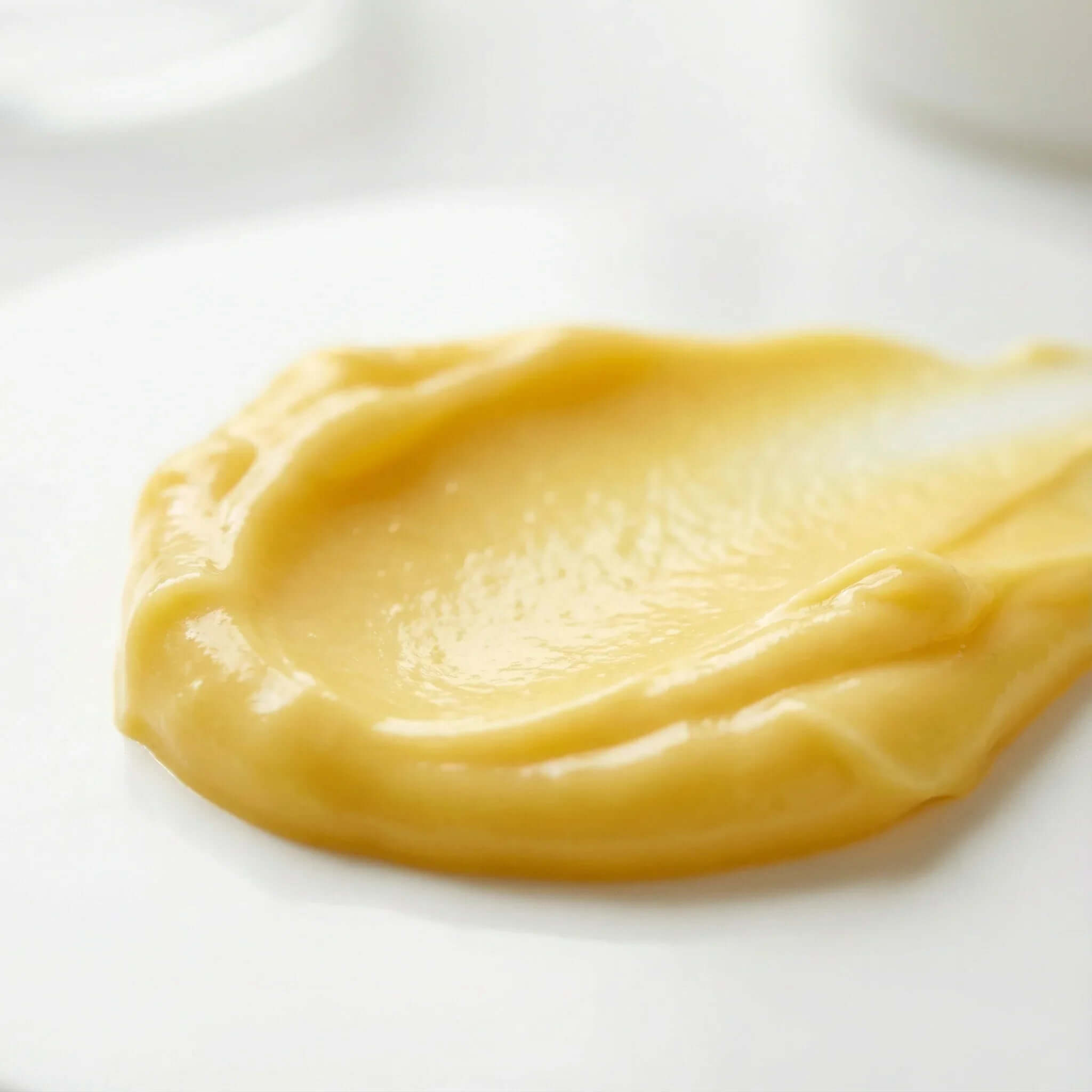 whitening night cream creamy texture showing its brightening and spot correction qualities DOS Cosmetics