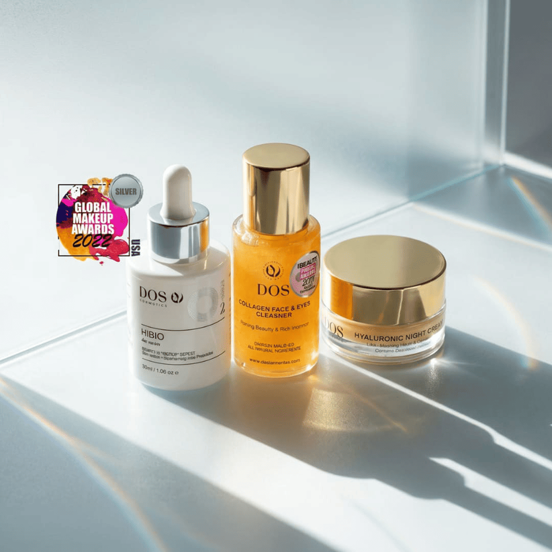 Skincare products on a reflective surface with promotional text and awards logo.