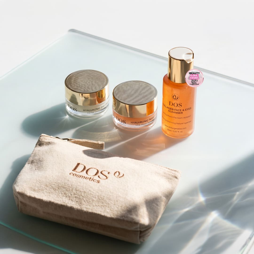 Cosmetic products including jars and a bottle on a glass surface with &