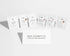 Six small white skincare sachets arranged in a row on a light gray background, with a white card in front reading &