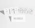 Six small white skincare sachets arranged in a row on a light gray background, with a white card in front reading &